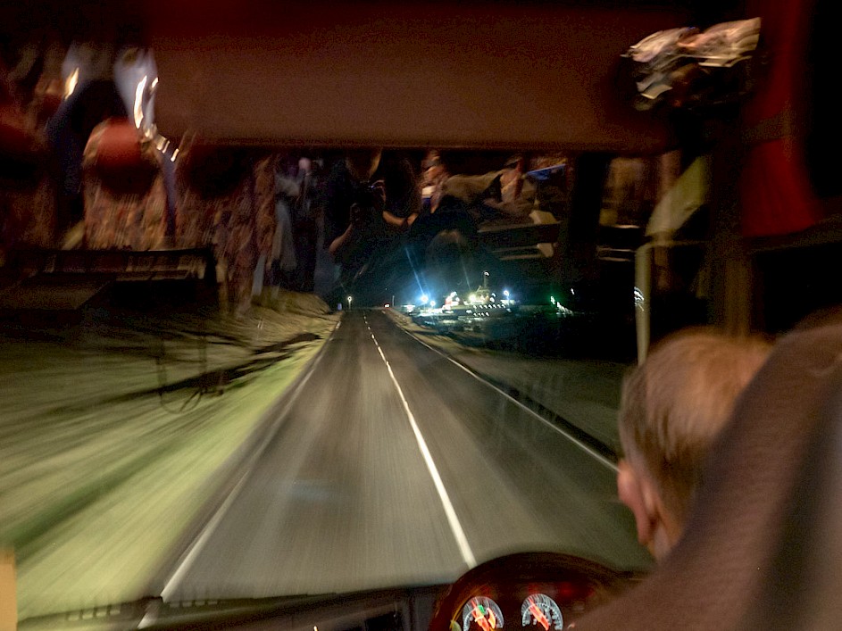 Leasks bus driving through the night - Photo Chris Brown